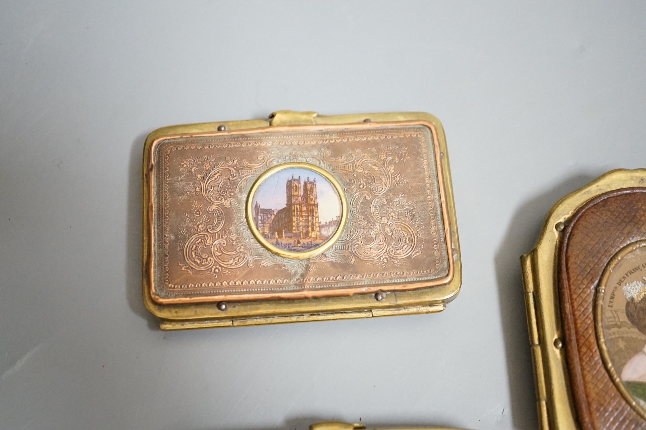 A 19th century Continental Royal commemorative purse and four Grand Tour souvenir purses